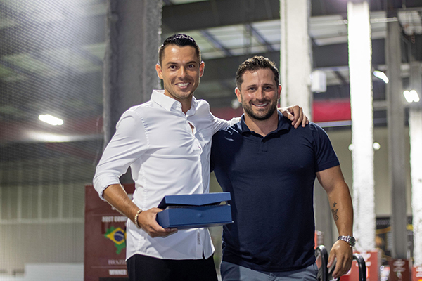 Keegan with Director of Coaching, Erik Hort at the Awards Banquet